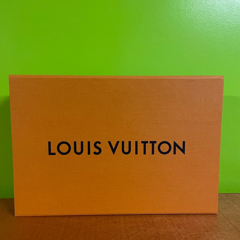Louis Vuitton Orange Box with magnetic clasp. Perfect condition, new.